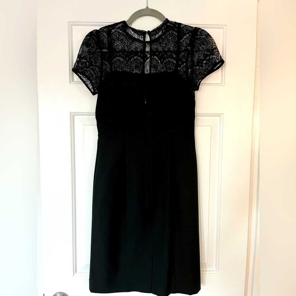 Black dress with lace top detail